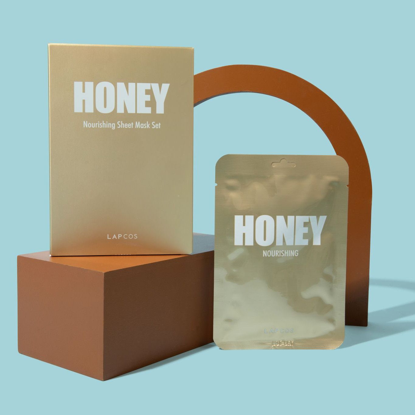 Daily Honey Face Mask 5-Pack box and single nourishing sheet mask.