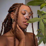 woman wearing daily honey sheet mask for skin nourishing and anti-bacterial