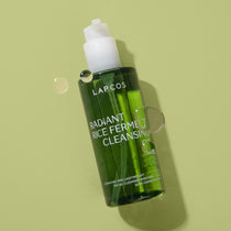 Lapcos Radiant Rice Ferment Cleansing Oil bottle on a light green background